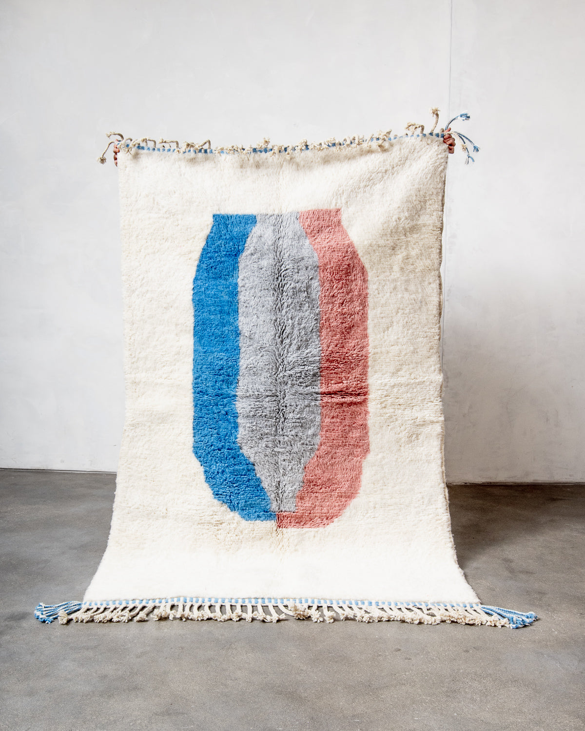 Modern, designer, handcrafted Berber rug from Morocco. Beniourain carpet with beautiful colours and patterns and fluffy wool texture.